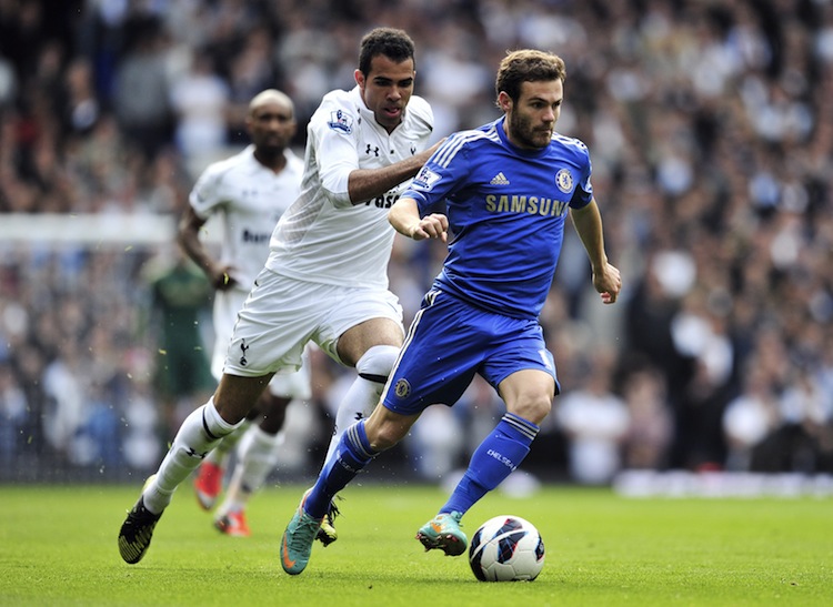 FBL-ENG-PR-TOTTENHAM-CHELSEA Juan Mata of Chelsea drives pasat Tottenham's Sandro in Saturday's English Premier League London derby match. Mata scored two goals and set up another in a convincing Chelsea win. (Glyn Kirk/AFP/Getty Images)