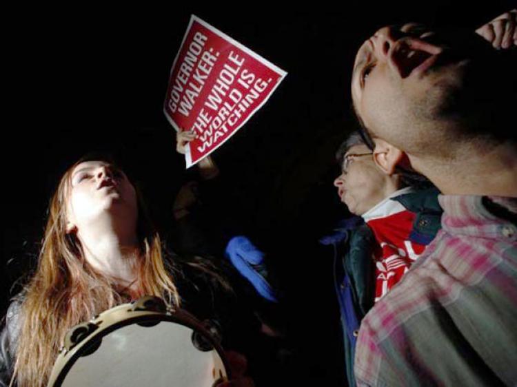 CONTINUED PROTEST: Protesters demonstrate outside the office of Wisconsin Gov. Scott Walker during his fireside chat at the Wisconsin State Capitol Feb. 22, in Madison. (Eric Thayer/Getty Images)