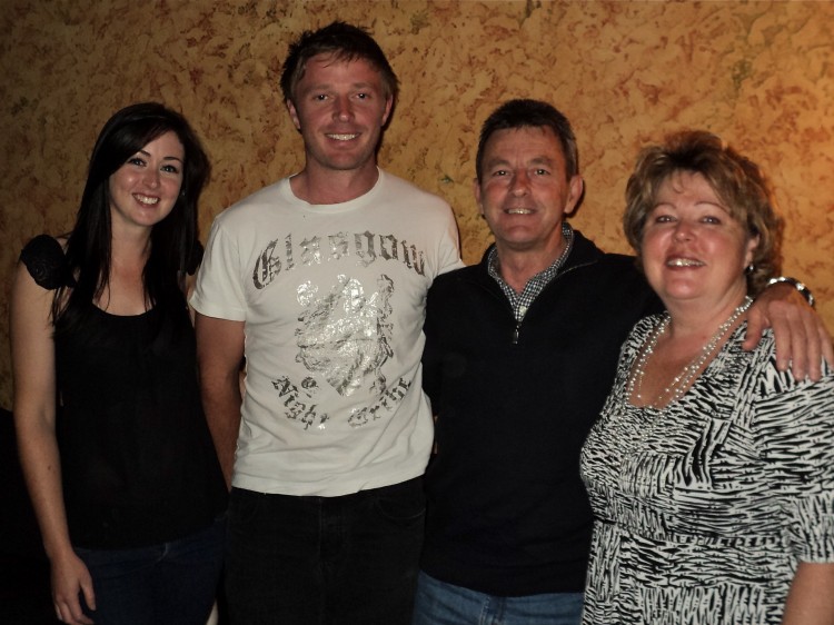ZooFamilyandfriend John Adnigde and his wife, Margaret (R), Kylie and Matt attend Shen Yun