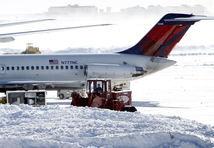 Snow removal equipment operates at Newark Liberty International Airport Terminal B following a major blizzard on December 27, 2010 in Newark, New Jersey. (Jeff Zelevansky/Getty Images) Snow removal equipment operates at Newark Liberty International Airport Terminal B following a major blizzard on December 27, 2010 in Newark, New Jersey. (Jeff Zelevansky/Getty Images)