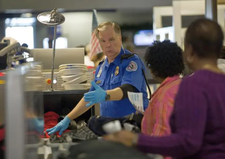 A TSA officer screens airline passengers in Terminal C at Dallas/Fort Worth International Airport, on  Dec 27, 2009, in Dallas, Texas.  (Tom Pennington/Getty Images)