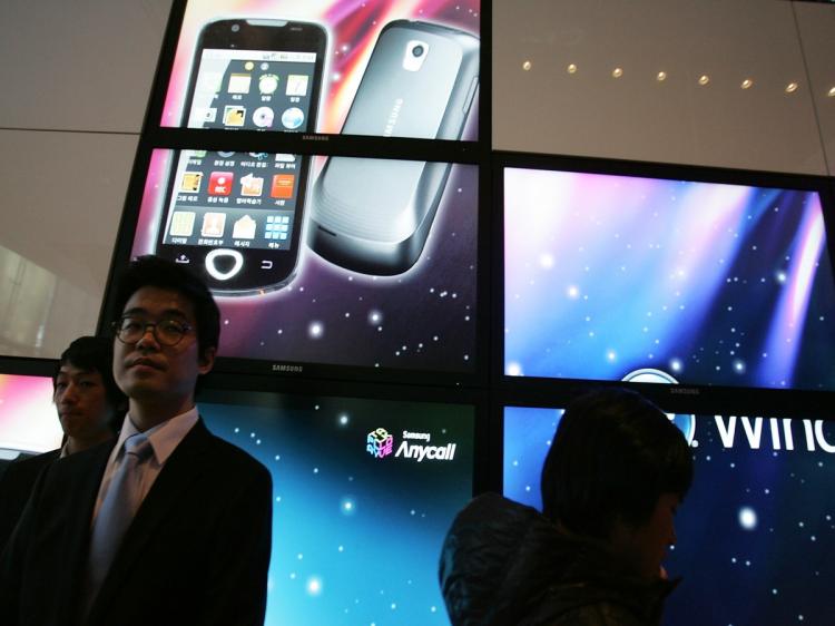Visitors attend Samsung Electronics Co's Android smartphones, during the unveiling ceremony on Feb 4, 2010 in South Korea. Google is reportedly planning a launch of a Google TV platform, partnering with Intel, Sony, and Logitech. (Chung Sung-Jun/Getty Images) Visitors attend Samsung Electronics Co's Android smartphones, during the unveiling ceremony on Feb 4, 2010 in South Korea. Google is reportedly planning a launch of a Google TV platform, partnering with Intel, Sony, and Logitech. (Chung Sung-Jun/Getty Images)