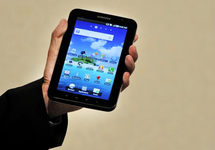 Android tablets are slated to take 15 percent of the market share by next year, according to a new report. Pictured above, Samsung's tablet device, the Galaxy Tab. (Odd Andersen/AFP/Getty Images) Android tablets are slated to take 15 percent of the market share by next year, according to a new report. Pictured above, Samsung's tablet device, the Galaxy Tab. (Odd Andersen/AFP/Getty Images)