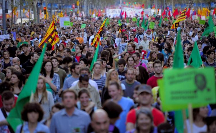 Austerity Protests: Demonstrators walk with flags, placards and banners in central Barcelona during the general strike held in Spain on September 29, 2010. (Josep Lago/AFP/Getty Images) Austerity Protests: Demonstrators walk with flags, placards and banners in central Barcelona during the general strike held in Spain on September 29, 2010. (Josep Lago/AFP/Getty Images)