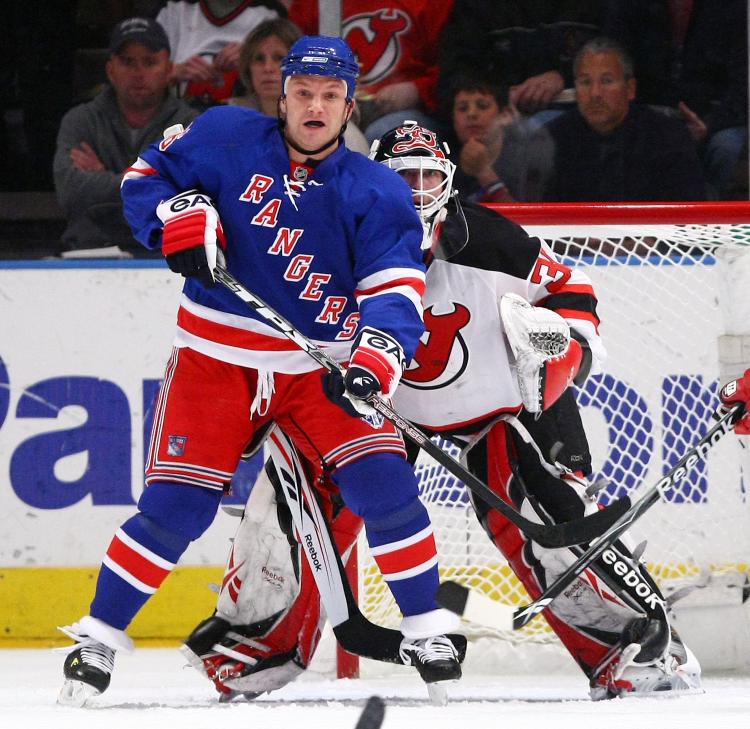 OLD FRIENDS: Sean Avery takes his position in front of Martin Brodeur at MSG on Monday night. (Chris McGrath/Getty Images) OLD FRIENDS: Sean Avery takes his position in front of Martin Brodeur at MSG on Monday night. (Chris McGrath/Getty Images)