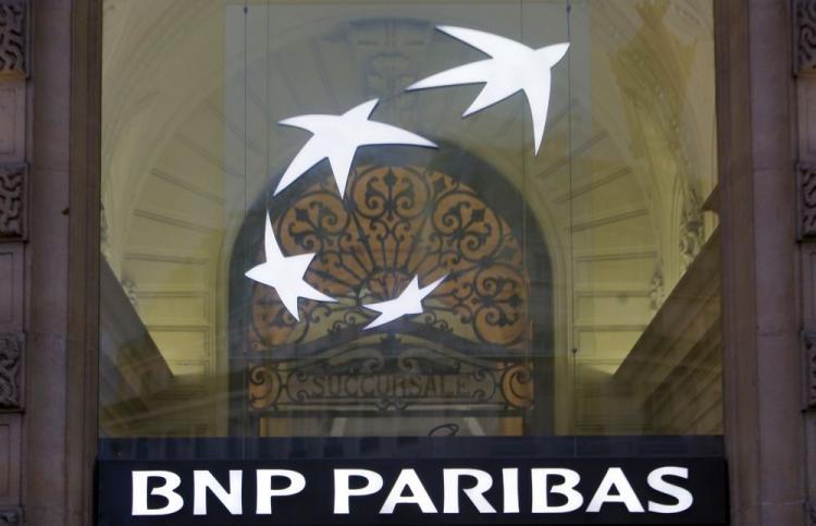 The logo of French bank BNP Paribas. The French competition authority on Monday announced it would fine 11 major French banks a total of 385 million euros (US$502 million) for charging unfairly high fees on interbank checks between 2002 and 2007. (Loic Venance/AFP/Getty Images) The logo of French bank BNP Paribas. The French competition authority on Monday announced it would fine 11 major French banks a total of 385 million euros (US$502 million) for charging unfairly high fees on interbank checks between 2002 and 2007. (Loic Venance/AFP/Getty Images)