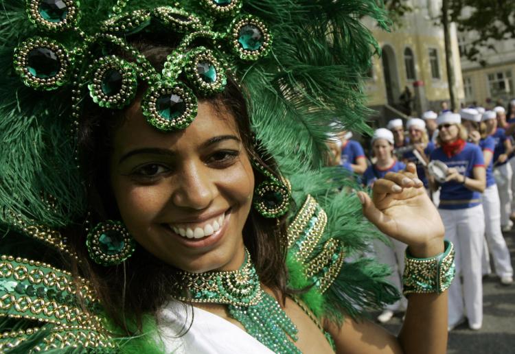 A participant from Brazil dances during the festival (ROLAND MAGUNIA/AFP/Getty Images) A participant from Brazil dances during the festival (ROLAND MAGUNIA/AFP/Getty Images)