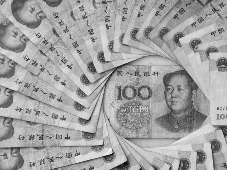 China's 100 Yuan, or Renminbi, note, the largest denomination in Chinese currency. (Frederick M. Brown/Getty Images) China's 100 Yuan, or Renminbi, note, the largest denomination in Chinese currency. (Frederick M. Brown/Getty Images)