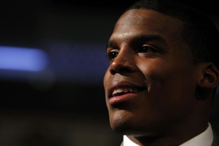 Cam Newton, quarterback of the Auburn Tigers, was named an AP All-American days after being awarded the Heisman Trophy. (Jeff Zelevansky/Getty Images) Cam Newton, quarterback of the Auburn Tigers, was named an AP All-American days after being awarded the Heisman Trophy. (Jeff Zelevansky/Getty Images)