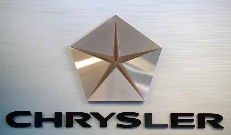 Chrysler Group LLC said that its second-quarter loss narrowed to $172 million, a smaller loss than the first quarter.  (Gabriel Bouys/Getty Images)