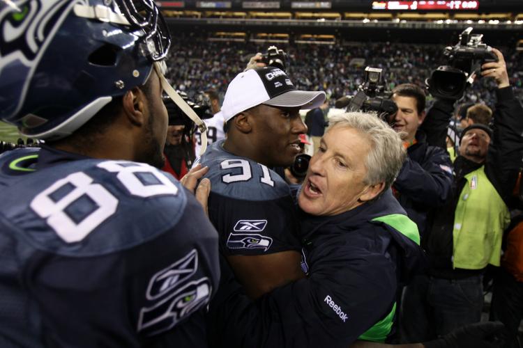 A FIRST TIME: Led by head coach Pete Carroll (right), the Seattle Seahawks become the first team to head into the postseason with a losing record. (Otto Greule Jr/Getty Images) A FIRST TIME: Led by head coach Pete Carroll (right), the Seattle Seahawks become the first team to head into the postseason with a losing record. (Otto Greule Jr/Getty Images)