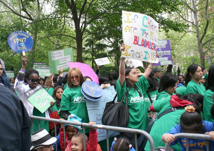 DAY CARE CRUNCH: Officials, parents, and children marched from Bowling Green to City Hall on Wednesday to protest the proposed closing of 15 day care centers in Manhattan, Queens, and Brooklyn. (The Epoch Times) DAY CARE CRUNCH: Officials, parents, and children marched from Bowling Green to City Hall on Wednesday to protest the proposed closing of 15 day care centers in Manhattan, Queens, and Brooklyn. (The Epoch Times)
