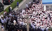 China’s Economic Slowdown Leads to Mass Layoffs and Workers’ Protests