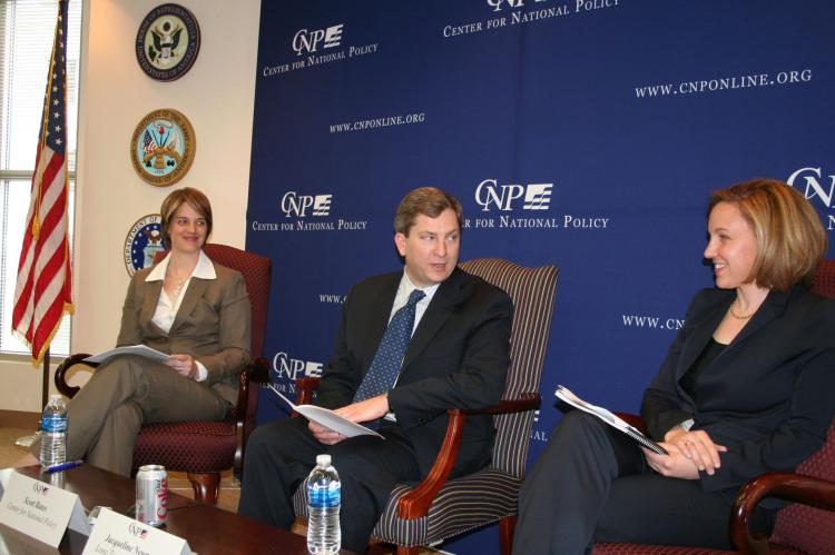 Jacqueline Newmyer (r), president and CEO of Long Term Strategy Group, and Kristen Gunness (l), advisor to the U.S. Department of the Navy, discuss the implications of today's economic downturn on China's military plans, while Scott Bates (center), vice-p (Gary Feuerberg/The Epoch Times) Jacqueline Newmyer (r), president and CEO of Long Term Strategy Group, and Kristen Gunness (l), advisor to the U.S. Department of the Navy, discuss the implications of today's economic downturn on China's military plans, while Scott Bates (center), vice-p (Gary Feuerberg/The Epoch Times)