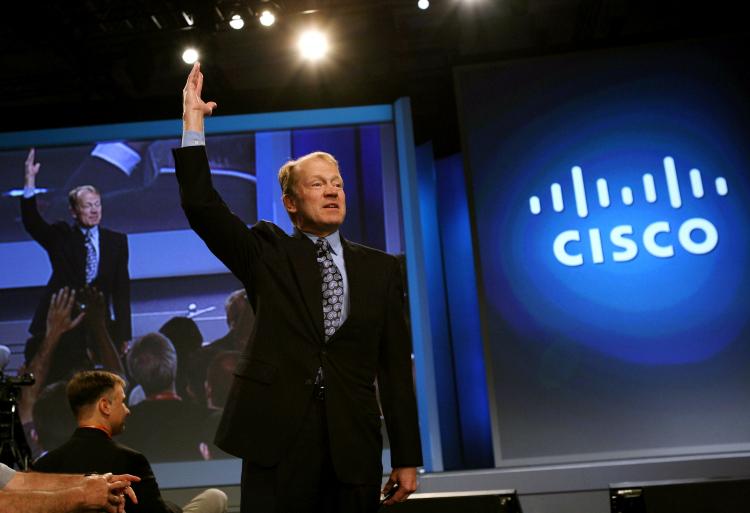 In this file photo, Cisco Chairman and CEO John delivers a keynote address during the RSA Conference in San Francisco, California. Cisco Systems announced that it was buying Starent Networks, which makes multimedia infrastructure for mobile operators. (Justin Sullivan/Getty Images) In this file photo, Cisco Chairman and CEO John delivers a keynote address during the RSA Conference in San Francisco, California. Cisco Systems announced that it was buying Starent Networks, which makes multimedia infrastructure for mobile operators. (Justin Sullivan/Getty Images)