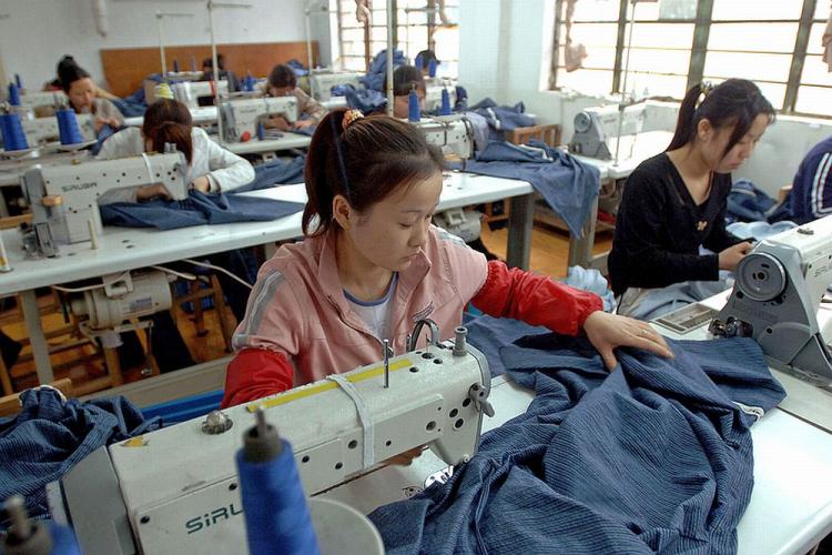 Clothing factories similar to this one in Anhui province, are facing crushing cost pressures. (AFP/Getty Images) Clothing factories similar to this one in Anhui province, are facing crushing cost pressures. (AFP/Getty Images)