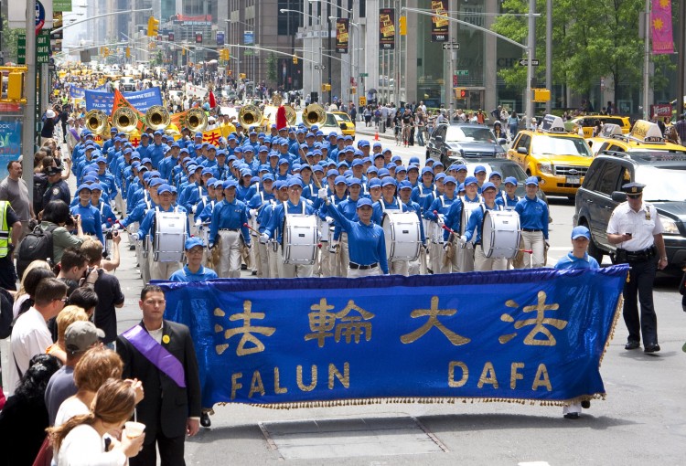 THE NEW CHINA: Falun Gong practitioners will hold a parade that is both colorfully cultural and a solemn remembrance of lives lost in persecution in Manhattan's Chinatown on Saturday, Aug. 27, at 1 p.m. (Dai Bing/The Epoch Times) THE NEW CHINA: Falun Gong practitioners will hold a parade that is both colorfully cultural and a solemn remembrance of lives lost in persecution in Manhattan's Chinatown on Saturday, Aug. 27, at 1 p.m. (Dai Bing/The Epoch Times)