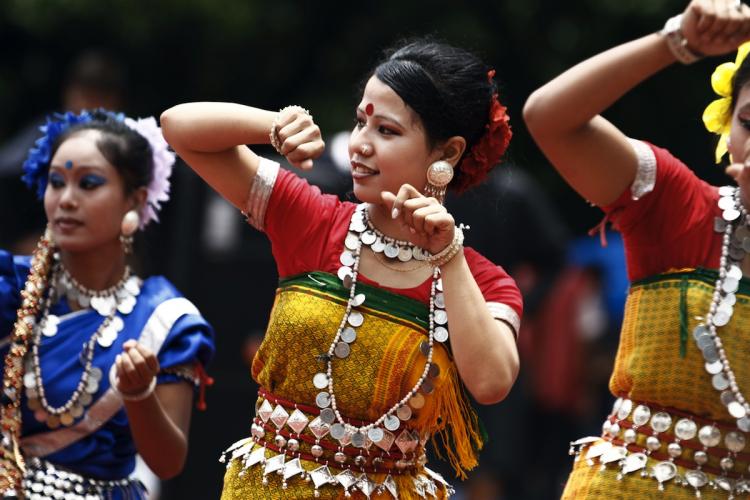 Bangladeshi tribal woman wearing traditional clothing dance at a rally held to mark International Indigenous Day in Dhaka on August 9. August 9 marks the day of the first meeting, in 1982, of the United Nations Working Group on Indigenous Populations.  (Strdel/Getty Iamges )