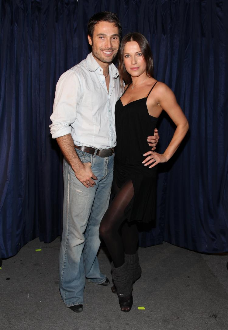 'Dancing with the Stars' dancer Edyta Sliwinska said she disagreed with the show's producers and left, according to a report on Monday. Pictured above, she and husband Alec Mazo perform at the 'Hands For Haiti' acoustic cirque show to benefit Doctors Without Borders at Le Studio Theater Space on February 6, 2010 in Santa Monica, California. (Angela Weiss/Getty Images)