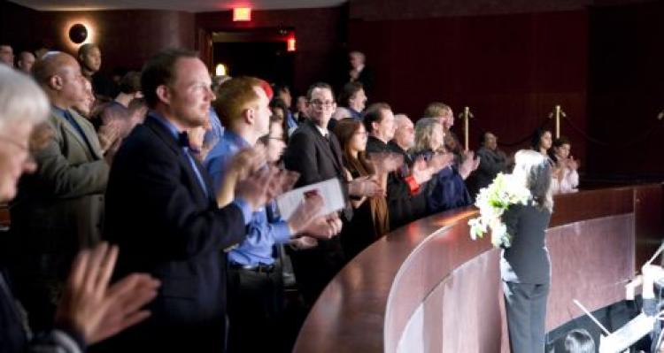 Audience members applaud the performance presented by Divine Performing Arts New York Company. (The Epoch Times) Audience members applaud the performance presented by Divine Performing Arts New York Company. (The Epoch Times)