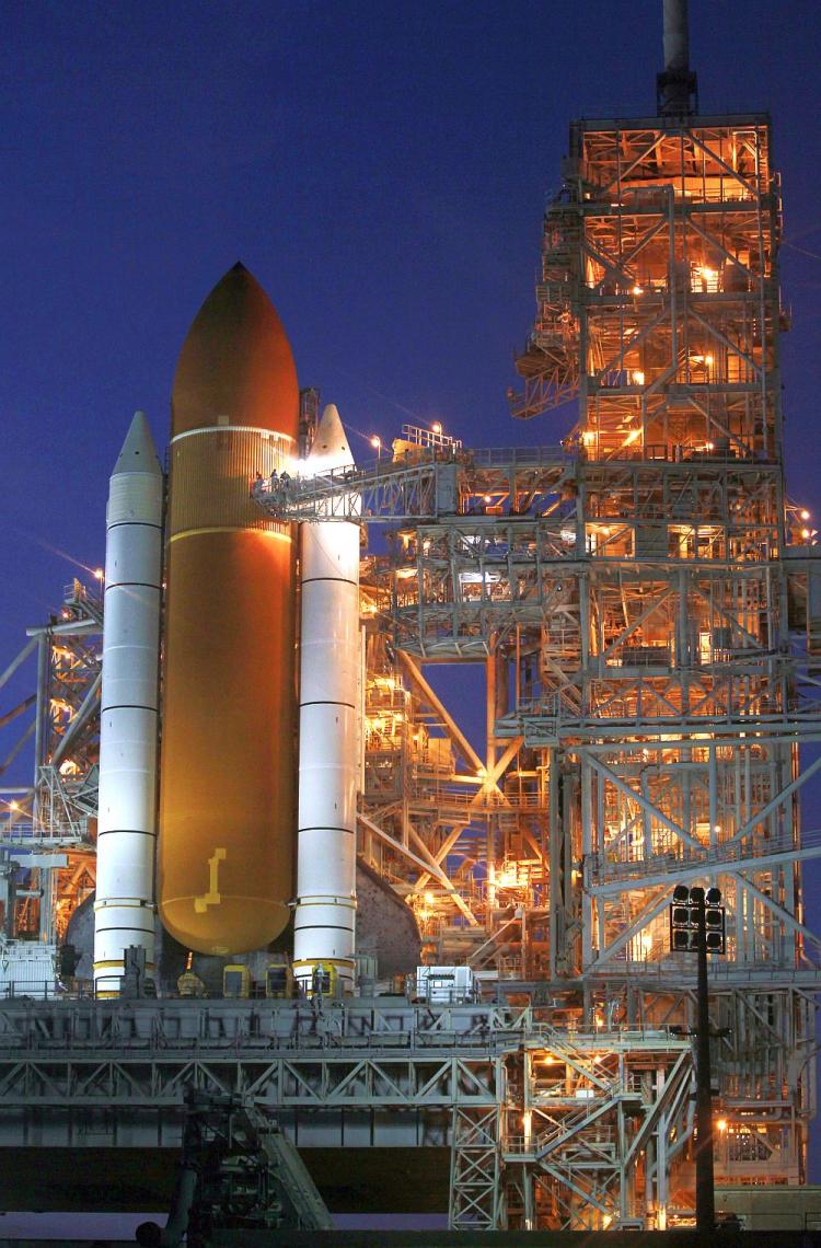 READY TO LAUNCH: Space shuttle Discovery sits on the launch pad as it is prepared for a scheduled Feb. 24 launch at Kennedy Space Center in Cape Canaveral, Fla. Space is a fragile place, not ruled by any nation, yet vital to modern military operations and modern lifestyles. (Joe Raedle/Getty Images) READY TO LAUNCH: Space shuttle Discovery sits on the launch pad as it is prepared for a scheduled Feb. 24 launch at Kennedy Space Center in Cape Canaveral, Fla. Space is a fragile place, not ruled by any nation, yet vital to modern military operations and modern lifestyles. (Joe Raedle/Getty Images)