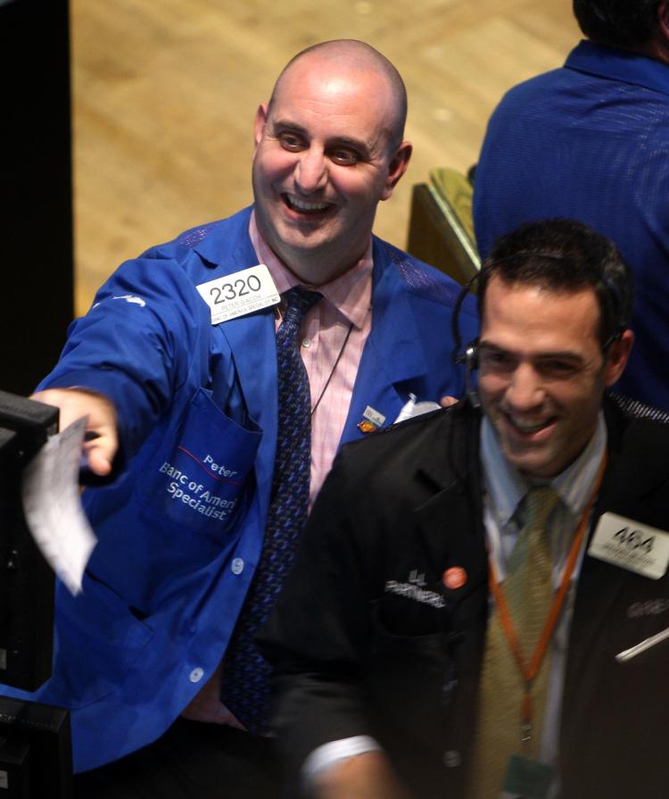 Traders on the floor of the New York Stock Exchange (NYSE) just before closing react to the high finishing number on the exchange October 28, 2008 in New York City. After a rally the Dow finished up nearly 900 points, gaining 10 percent. (Spencer Platt/Getty Images) Traders on the floor of the New York Stock Exchange (NYSE) just before closing react to the high finishing number on the exchange October 28, 2008 in New York City. After a rally the Dow finished up nearly 900 points, gaining 10 percent. (Spencer Platt/Getty Images)