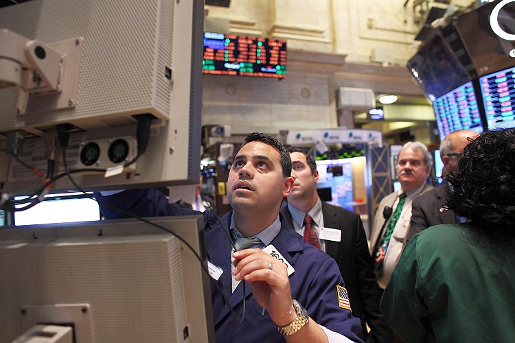 Traders work on the floor of the New York Stock Exchange Traders work on the floor of the New York Stock Exchange