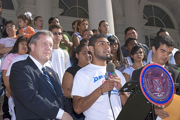 DREAM ACT: A New York City immigrant high school senior (C) who does not have a Social Security number describes his challenges in obtaining funding for college. Council members Daniel Dromm (L) and Ydanis Rodriguez (R) joined the student at a rally at City Hall in support of the DREAM Act on Wednesday in New York City. (Henry Lam/The Epoch Times) DREAM ACT: A New York City immigrant high school senior (C) who does not have a Social Security number describes his challenges in obtaining funding for college. Council members Daniel Dromm (L) and Ydanis Rodriguez (R) joined the student at a rally at City Hall in support of the DREAM Act on Wednesday in New York City. (Henry Lam/The Epoch Times)