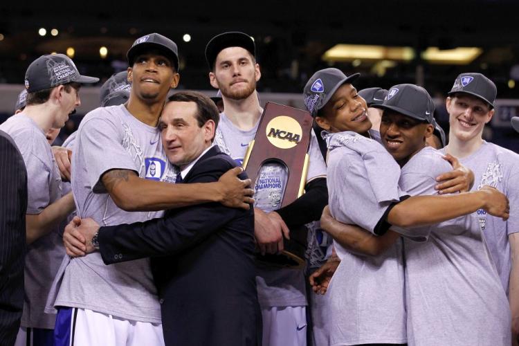 Duke senior Lance Thomas hugs coach Mike Krzyzewski while the Blue Devils celebrate. (Jonathan Daniel/Getty Images) Duke senior Lance Thomas hugs coach Mike Krzyzewski while the Blue Devils celebrate. (Jonathan Daniel/Getty Images)
