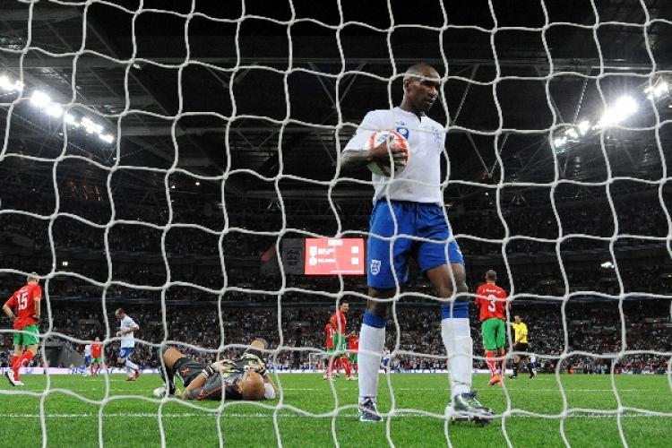 ENGLAND VS BULGARIA: England's Jermain Defoe in foreground, picks the ball out of the net after teammate Adam Johnson scored against Bulgaria during the qualifying Euro football match at Wembley Stadium on September 3, 2010. (Adrian Dennis/AFP/Getty Images ) ENGLAND VS BULGARIA: England's Jermain Defoe in foreground, picks the ball out of the net after teammate Adam Johnson scored against Bulgaria during the qualifying Euro football match at Wembley Stadium on September 3, 2010. (Adrian Dennis/AFP/Getty Images )
