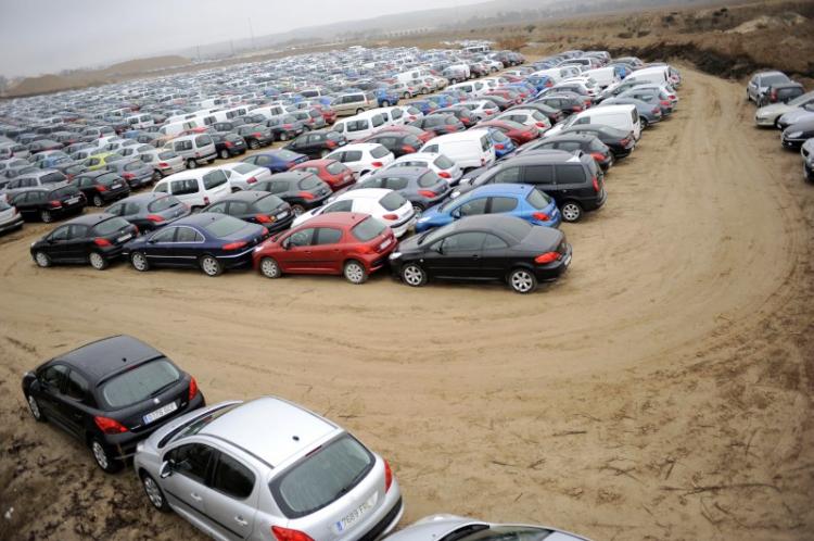 Vehicles are parked on a warehouse in Aranjuez on December 4, 2008. Spain's auto sector, the third biggest in Europe, has been badly hit by the economic slowdown, and many automakers in the country have announced staff cutbacks. (Pedro Armestre/AFP/Getty Images/)