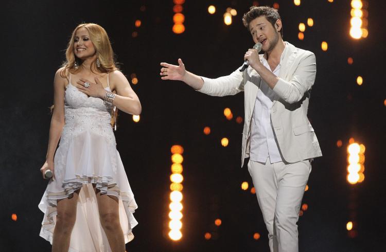Ell and Nikki from Azerbaijan perform the winning piece in the grand finale of the Eurovision Song Contest 2011 in Dusseldorf, Germany. They beat out favorites such as Moldova, Jedward, and Blue. (Sean Gallup/Getty Images)