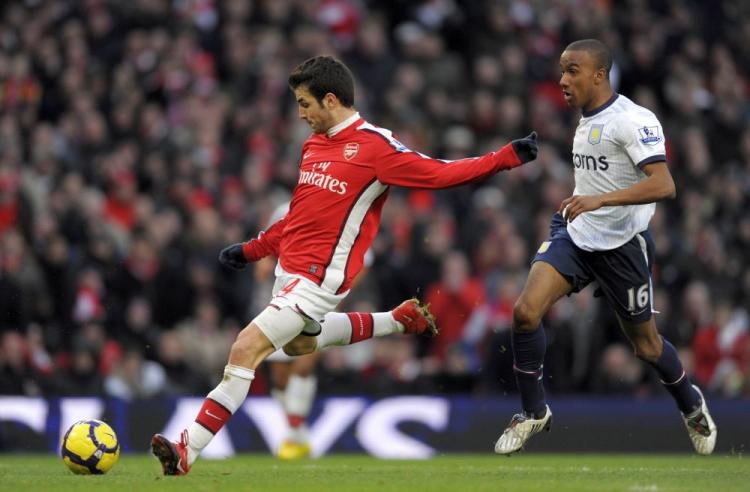AROUND THE KEEPER: Cesc Fabregas scores his second goal of the game as Arsenal ran out comfortable winners on Sunday against Middlesbrough. (Hamish Blair/Getty Images) AROUND THE KEEPER: Cesc Fabregas scores his second goal of the game as Arsenal ran out comfortable winners on Sunday against Middlesbrough. (Hamish Blair/Getty Images)