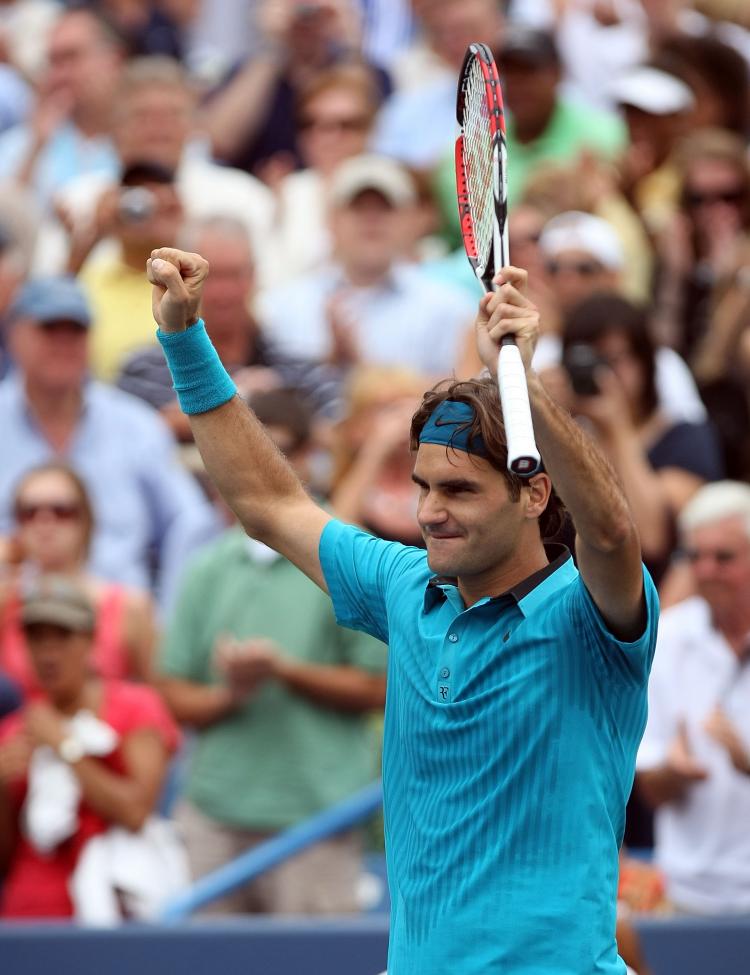ALMOST THERE: Federer has a shot at tying Sampras's record of 14 grand slam titles. (WILLIAM WEST/AFP/Getty Images) ALMOST THERE: Federer has a shot at tying Sampras's record of 14 grand slam titles. (WILLIAM WEST/AFP/Getty Images)