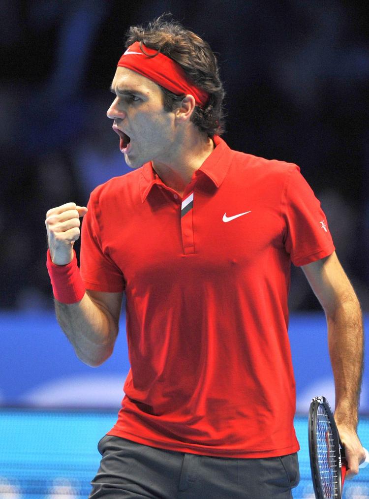 Roger Federer went undefeate 3-0 with his straight-set victory over Robin Soderling on Thursday at the ATP World Tour Finals. (Glyn Kirk/AFP/Getty Images) Roger Federer went undefeate 3-0 with his straight-set victory over Robin Soderling on Thursday at the ATP World Tour Finals. (Glyn Kirk/AFP/Getty Images)