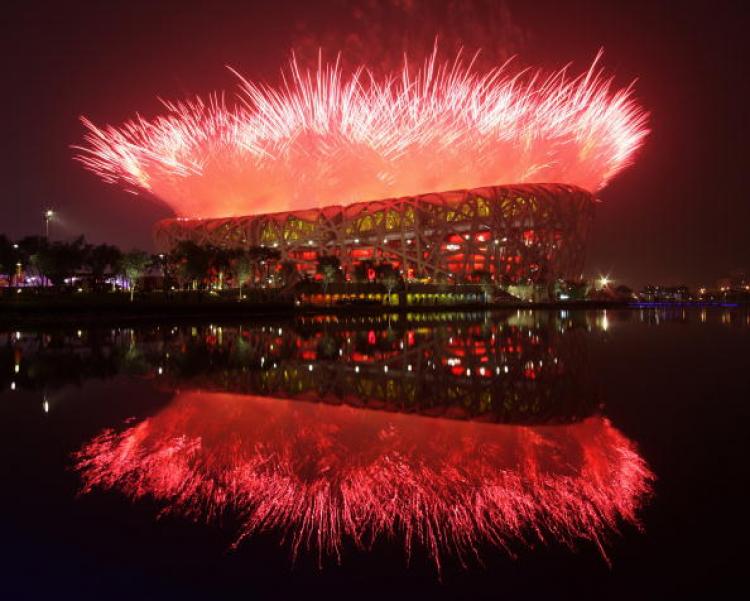Fireworks explode over the National Stadium during the Opening Ceremony for the Beijing 2008 Olympic Games at the National Stadium on August 8 in Beijing, China. (Clive Rose/Getty Images) Fireworks explode over the National Stadium during the Opening Ceremony for the Beijing 2008 Olympic Games at the National Stadium on August 8 in Beijing, China. (Clive Rose/Getty Images)