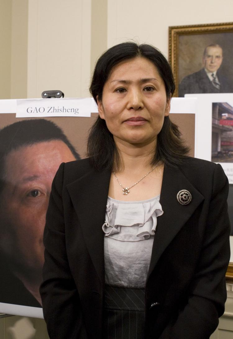 HUSBANDLESS: Geng He, wife of civil rights attorney Gao Zhisheng. Gao has released several letters detailing the torture he was subjected to while in captivity. He is currently being held in extralegal custody, and his whereabouts and welfare are unknown. (Lisa Fan/The Epoch Times) HUSBANDLESS: Geng He, wife of civil rights attorney Gao Zhisheng. Gao has released several letters detailing the torture he was subjected to while in captivity. He is currently being held in extralegal custody, and his whereabouts and welfare are unknown. (Lisa Fan/The Epoch Times)