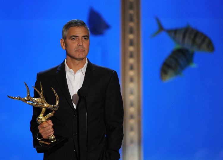 George Clooney is set to receive a Bob Hope Humanitarian Award at the Primetime Emmy Awards on Sunday night. (Kevin Winter/Getty Images) George Clooney is set to receive a Bob Hope Humanitarian Award at the Primetime Emmy Awards on Sunday night. (Kevin Winter/Getty Images)