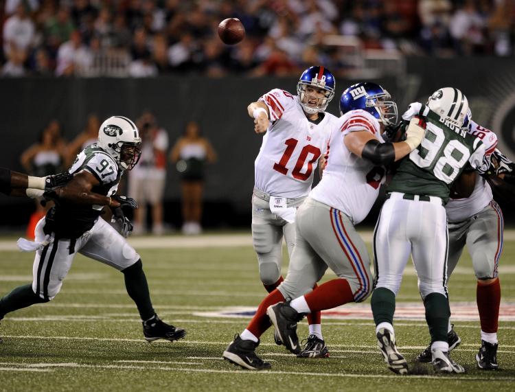 New York's two professional football teams meet in preseason action Saturday night. (Jeff Zelevansky/Getty Images) New York's two professional football teams meet in preseason action Saturday night. (Jeff Zelevansky/Getty Images)