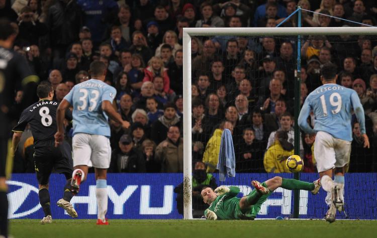 BIG SAVE: Chelsea's Frank Lampard #8 can't beat Manchester City's Shay Given from the penalty spot.