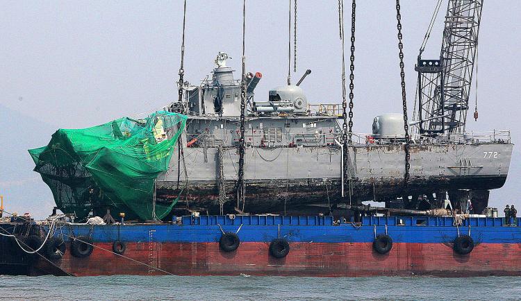 Sunken South Korean warship PCC-772 Cheonan is placed on a barge after being raised by a giant crane, April 15, 2010. South Korea's military believes a North Korean submarine torpedoed a South Korean warship March, the Yonhap news agency said. (Byun Yeong-Wook/AFP/Getty Images) Sunken South Korean warship PCC-772 Cheonan is placed on a barge after being raised by a giant crane, April 15, 2010. South Korea's military believes a North Korean submarine torpedoed a South Korean warship March, the Yonhap news agency said. (Byun Yeong-Wook/AFP/Getty Images)