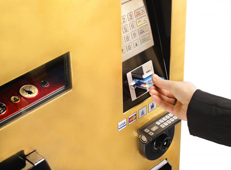 A Gold to go ATM which dispenses gold coins and bars. (Courtesy of Gold to go.) A Gold to go ATM which dispenses gold coins and bars. (Courtesy of Gold to go.)