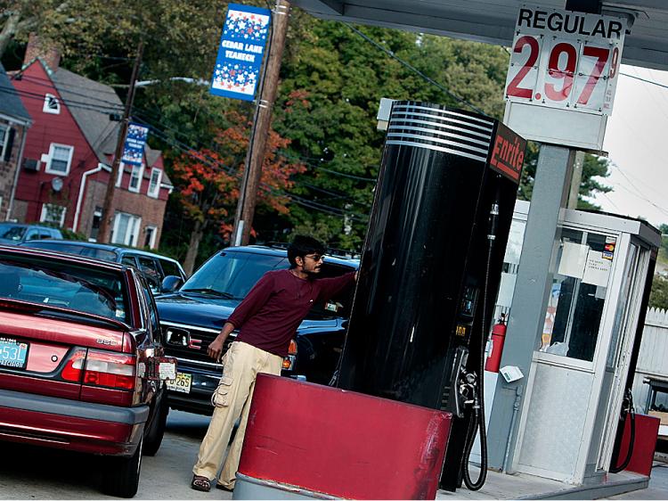 A service station attendant pumps gasoline at $2.97 a gallon in Teaneck, New Jersey. (Chris Hondros/Getty Images) A service station attendant pumps gasoline at $2.97 a gallon in Teaneck, New Jersey. (Chris Hondros/Getty Images)