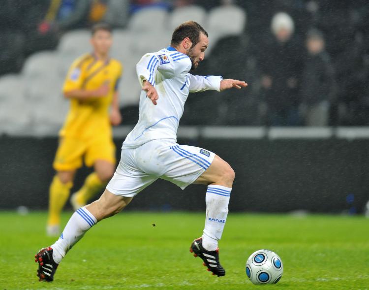 ON THE WAY TO GOAL: Greece's Dimitrios Salpigidis runs to score against Ukraine during their FIFA World Cup 2010 playoff qualification match in Donetsk on Wednesday. (SERGEI SUPINSKY/AFP/Getty Images) ON THE WAY TO GOAL: Greece's Dimitrios Salpigidis runs to score against Ukraine during their FIFA World Cup 2010 playoff qualification match in Donetsk on Wednesday. (SERGEI SUPINSKY/AFP/Getty Images)