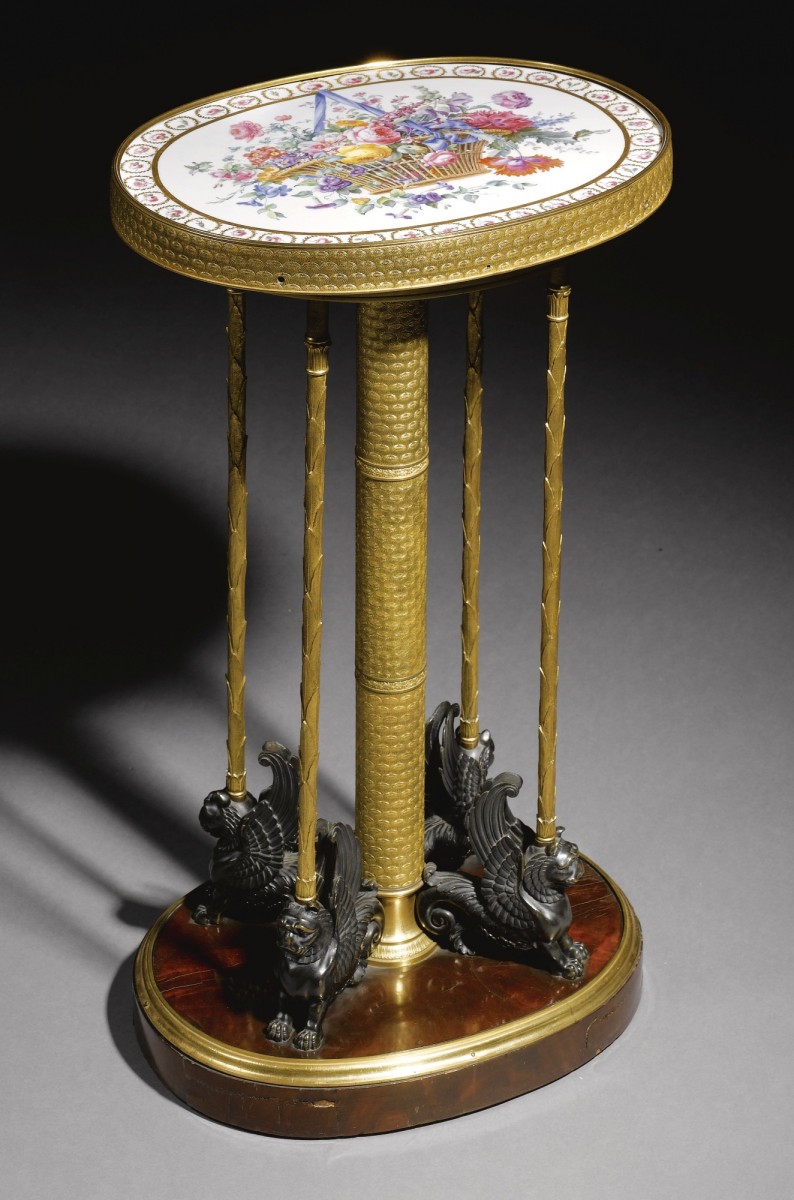 A gilt-bronze and patinated-bronze gueridon table. (Courtesy of exhibited by Il Quadrifoglio SRL) A gilt-bronze and patinated-bronze gueridon table. (Courtesy of exhibited by Il Quadrifoglio SRL)