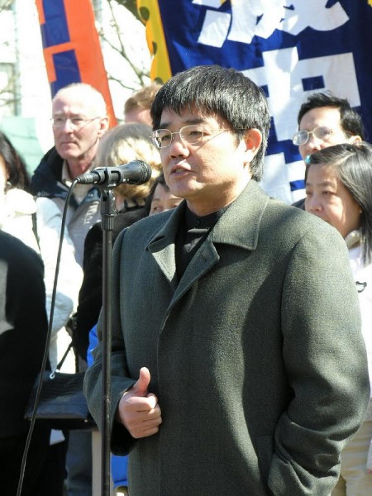 Chinese human rights lawyer Guo Guoting speaking at a rally against the Chinese Communist Party. (The Epoch Times)