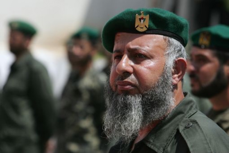 A Hamas security man looks on as his leader Ismail Haniya (unseen) reviews the honour guard during a visit to the Hamas security headquarters in Gaza City on July 7, 2008. (Mohammed Abed/AFP/Getty Images) A Hamas security man looks on as his leader Ismail Haniya (unseen) reviews the honour guard during a visit to the Hamas security headquarters in Gaza City on July 7, 2008. (Mohammed Abed/AFP/Getty Images)