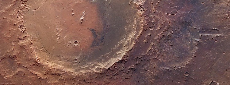 ANOTHER ASTEROID: Holden crater is 140 km across, filling the left side of the image, while to the right is the remaining part of Eberswalde crater, with a diameter of about 65 km. They are located in the southern highlands of Mars. (ESA/DLR/FU Berlin, G. Neukum)
