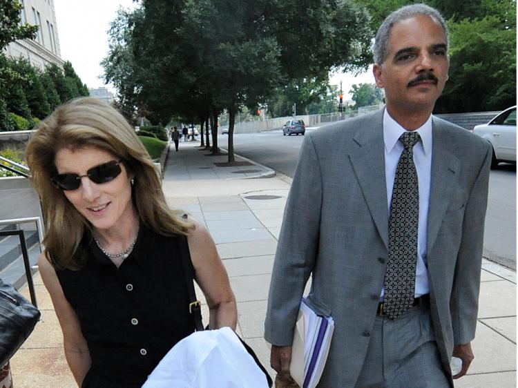 Former deputy attorney general Eric Holder walks with Caroline Kennedy (L), daughter of late U.S. president John F. Kennedy, on Capitol Hill in Washington on June 25, 2008. (Tim Sloan/AFP/Getty Images) Former deputy attorney general Eric Holder walks with Caroline Kennedy (L), daughter of late U.S. president John F. Kennedy, on Capitol Hill in Washington on June 25, 2008. (Tim Sloan/AFP/Getty Images)