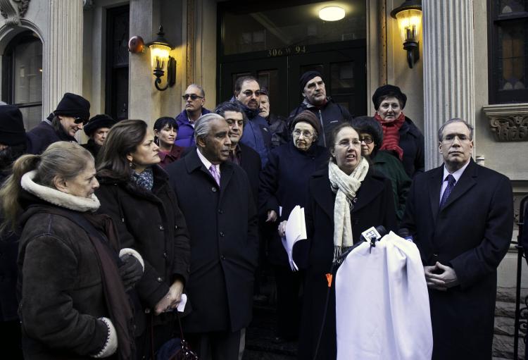 HOTEL OR SHELTER? Upper West Side residents and officials stood outside Hotel Alexander on West 94th Street on Sunday in protest of the Department of Homeless Services' plan to convert the building into a transitional shelter for 200 homeless men. At microphone (C) is Councilwoman Gail Brewer, Manhattan Borough President Scott Stringer (R), Councilwoman Melissa Mark-Viverito (second from L), and Rep. Charles Rangel (third from L). (Phoebe Zhang/The Epoch Times)
